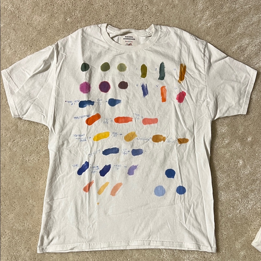 White T-Shirt with Colorful Paint Swatches